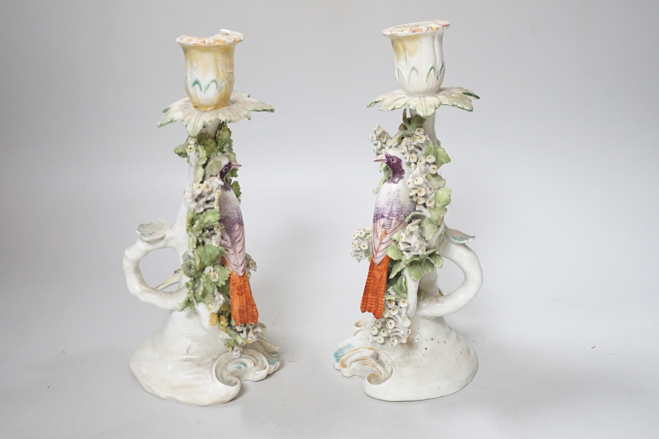 A pair of Derby ‘bird’ candlesticks, c.1760-5, 28cm